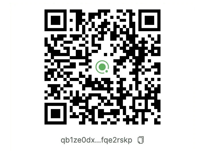 The Qbit Wallet receive screen showing a QR code above a shortened qb1 address.